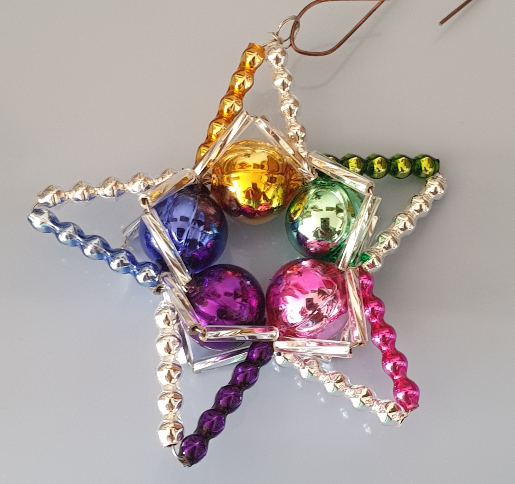 Vánoční hvězdička Ø6cm - 3D-barevná/duha