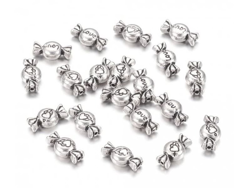 Korálek kovový - bonbon 11x6x3 mm (2ks)