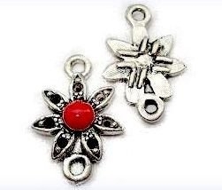Mezikus kovový - červená květina 21x14mm