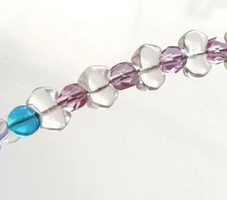Korálky skleněné (sáček 20g) - mašlička 9×6mm, průhledná