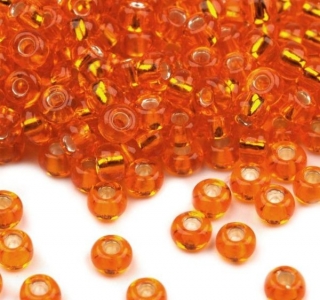Korálky/rokajl s průtahem - oranžová > (6/0) Ø4,1mm (sáček 30g)