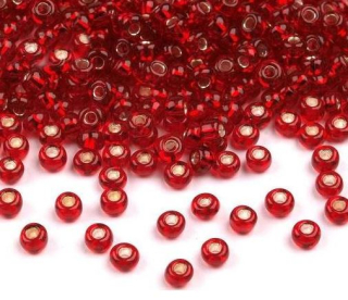 Rokajl PRECIOSA červená tmavá s průtahem > (11/0) Ø2,0mm (sáček 20g)