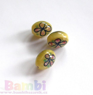 Vinuté perle - oválek zdobený - žlutá s kytkou 16×12mm